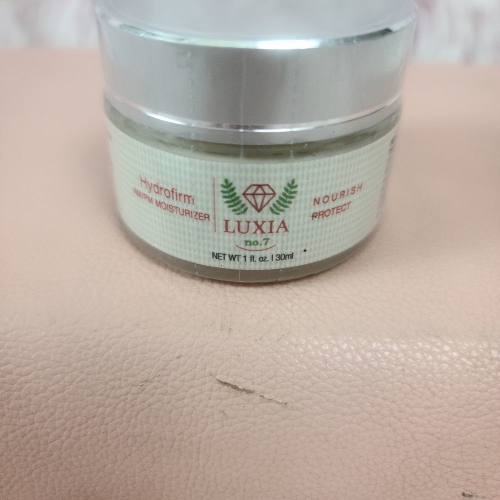 Lucia Hydrofirm AM/PM Moisturizer.  Net with 1 oz